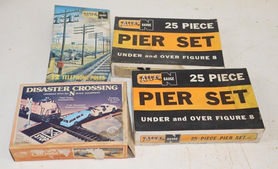 Group of 4 Model Train Telephone Poles, Pier Sets, and Disaster Crossing Accessories In Original: 8" x 4.5" x 1" each