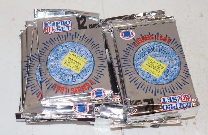 Group of 14 1991 NFL Pro Set Unopened Trading Card Packs: 2.5" x 3.5" each