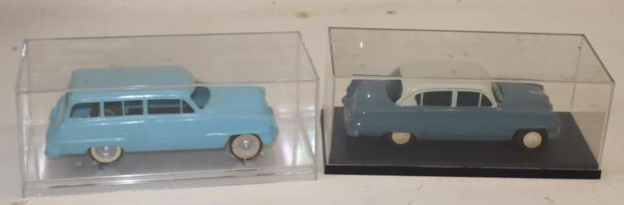Group of 2 Early 1950s Plymouth Station Wagon and Sedan Assembled Models in Display Cases: 1/25th Scale. 9.5" x 4" x 4" each