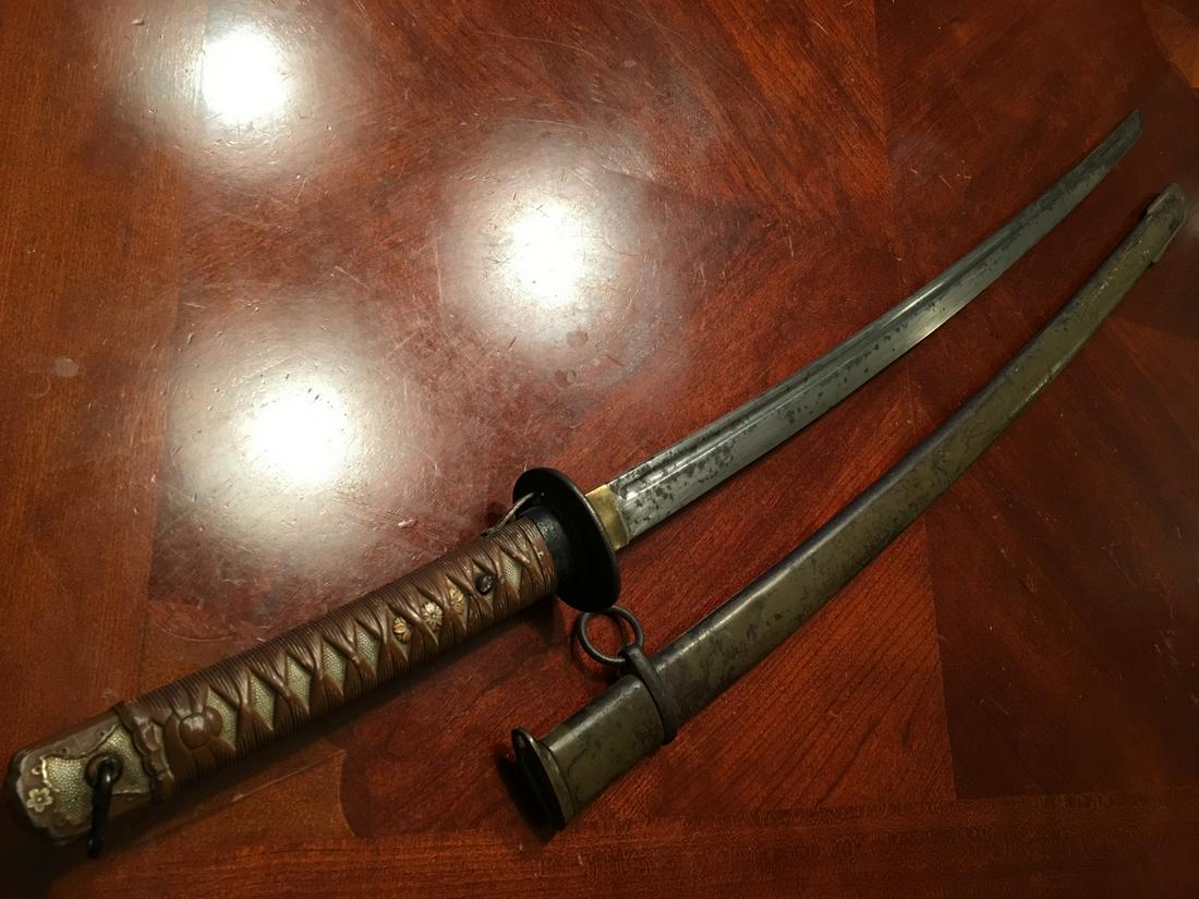 WWII Japanese Sword, 36" overall length: WWII Japanese Sword, 36" overall length, 28" long blade, very sharp. Marked