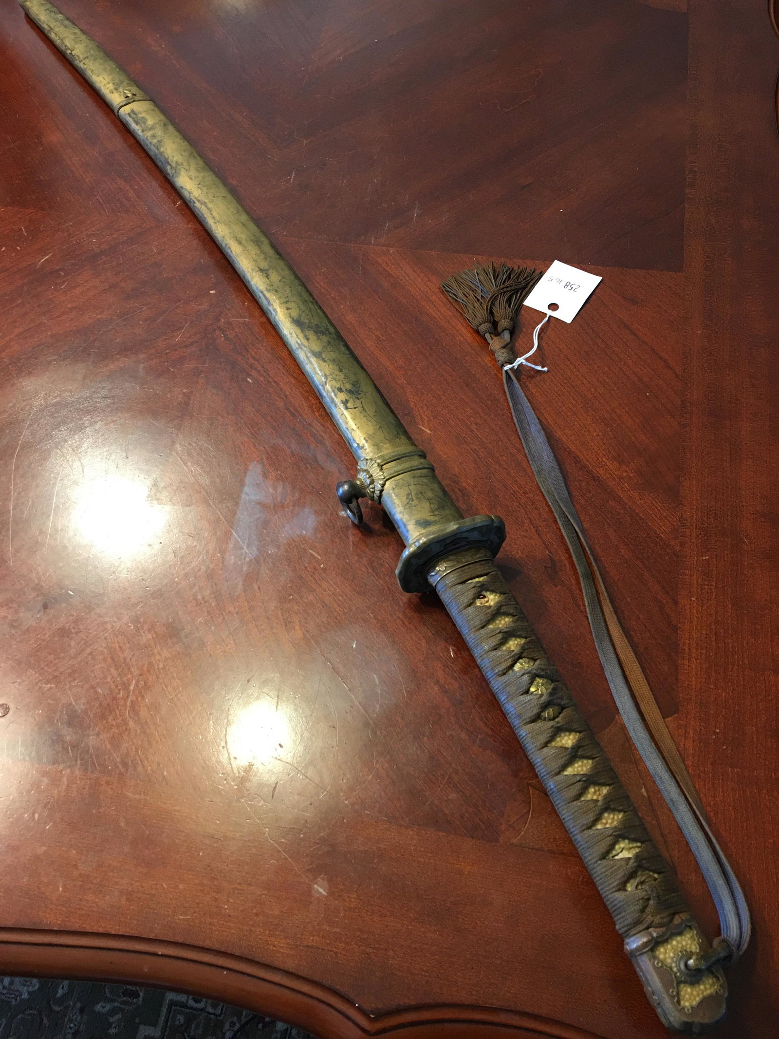 OLD WWII FINE JAPANESE OFFICER'S SWORD AND SCABBARD, 27" LONG BLADE: OLD WWII FINE JAPANESE OFFICER'S SWORD AND SCABBARD, 27" LONG BLADE. Overall 40" long