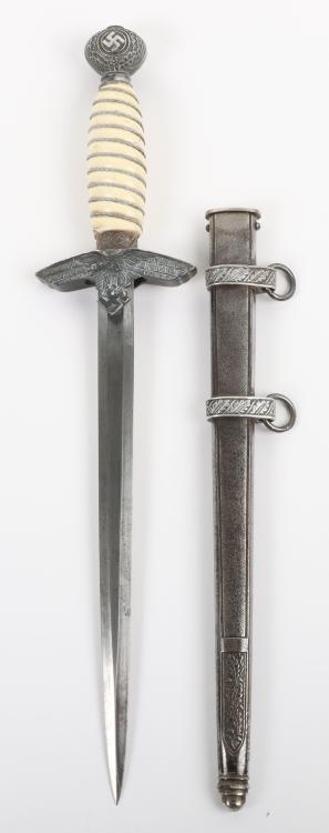 WW2 German Luftwaffe 2nd Pattern Officers Dress Dagger: WW2 German Luftwaffe 2nd Pattern Officers Dress Dagger by Richard Herder Solingen, standard 2nd model example with white celluloid grip retaining the wire binding. Pommel with swastika to both sides a