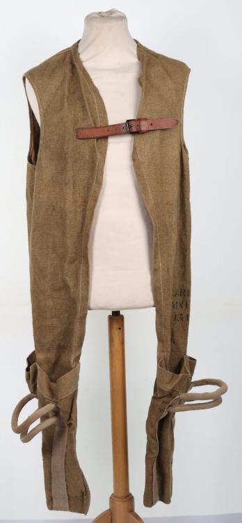 WW1 British Artillery 1917 Dated Ammunition Carrier: WW1 British Artillery 1917 Dated Ammunition Carrier Jerkin, fine heavy canvas cloth jerkin with large pockets and ability to carry the 13 and 18pdr artillery shells. Leather chest straps still in plac