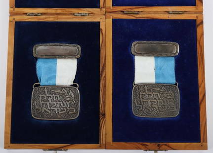 2x Sterling Silver Medals - Reviving the Ancient Soil of Israel: 2x Sterling Silver Medals - Reviving the Ancient Soil of Israel, heavy sterling silver rectangular medals complete with ribbons and top mount bar. Housed in wooden presentation cases. (2 items)