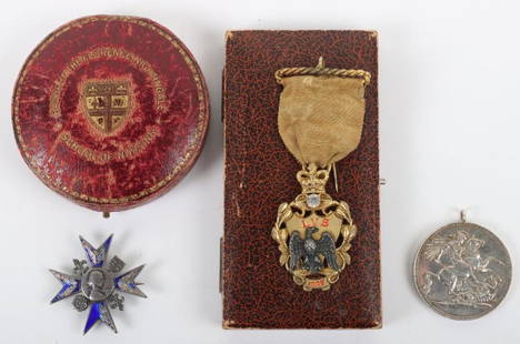 Award – Badge of the Florence Nightingale School of Nursing: Award – Badge of the Florence Nightingale School of Nursing, award housed in the original John Pinches London case with gilt tooled decoration to the lid. Award has some damage to the blue