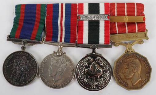 * WW2 Canadian Medal Group of Four: * WW2 Canadian Medal Group of Four, consisting Canadian Volunteer Service medal 1939-45, War Medal 1939-45 (Canadian issue in silver), Canadian Special Services medal with clasp NATO OTAN (1st 3