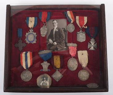 Framed Collection of Army Temperance Medals: Framed Collection of Army Temperance Medals, consisting of 11 medals all awarded to 23483 D R Francis Royal Horse Artillery. Medals are mounted on velvet cushion frame with his original WW1 period