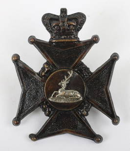 Victorian Hertfordshire Rifle Volunteers Headdress Badge: Victorian Hertfordshire Rifle Volunteers Headdress Badge, blackened crowned Maltese cross with central lying stag. Reverse with lug fittings.