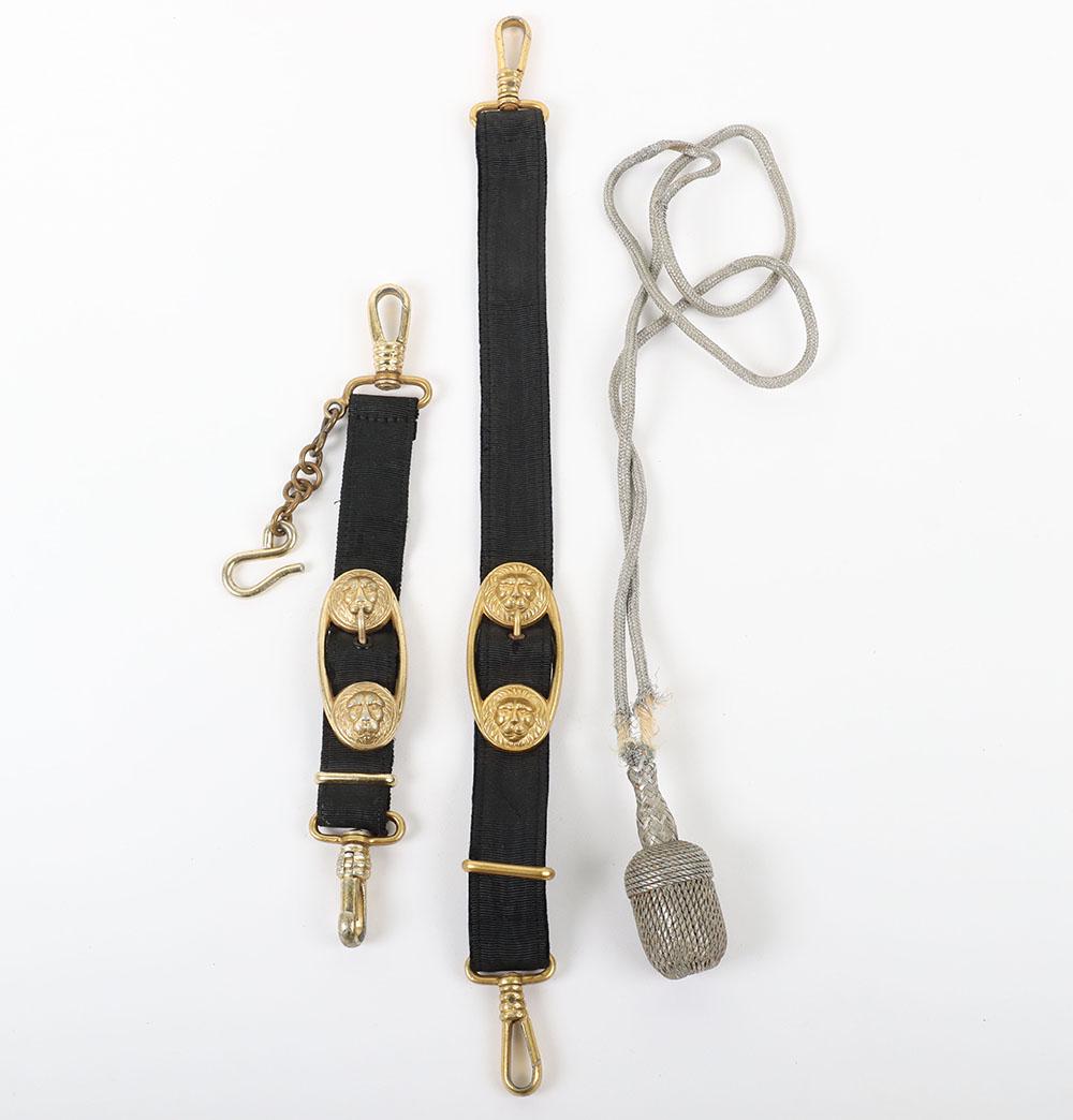 WW2 German Naval (Kriegsmarine) Officers Dagger Accoutrements: WW2 German Naval (Kriegsmarine) Officers Dagger Accoutrements, being an original pair of dagger hangers consisting of long and short pattern straps with gilt lion head mounts. Accompanied by an origin