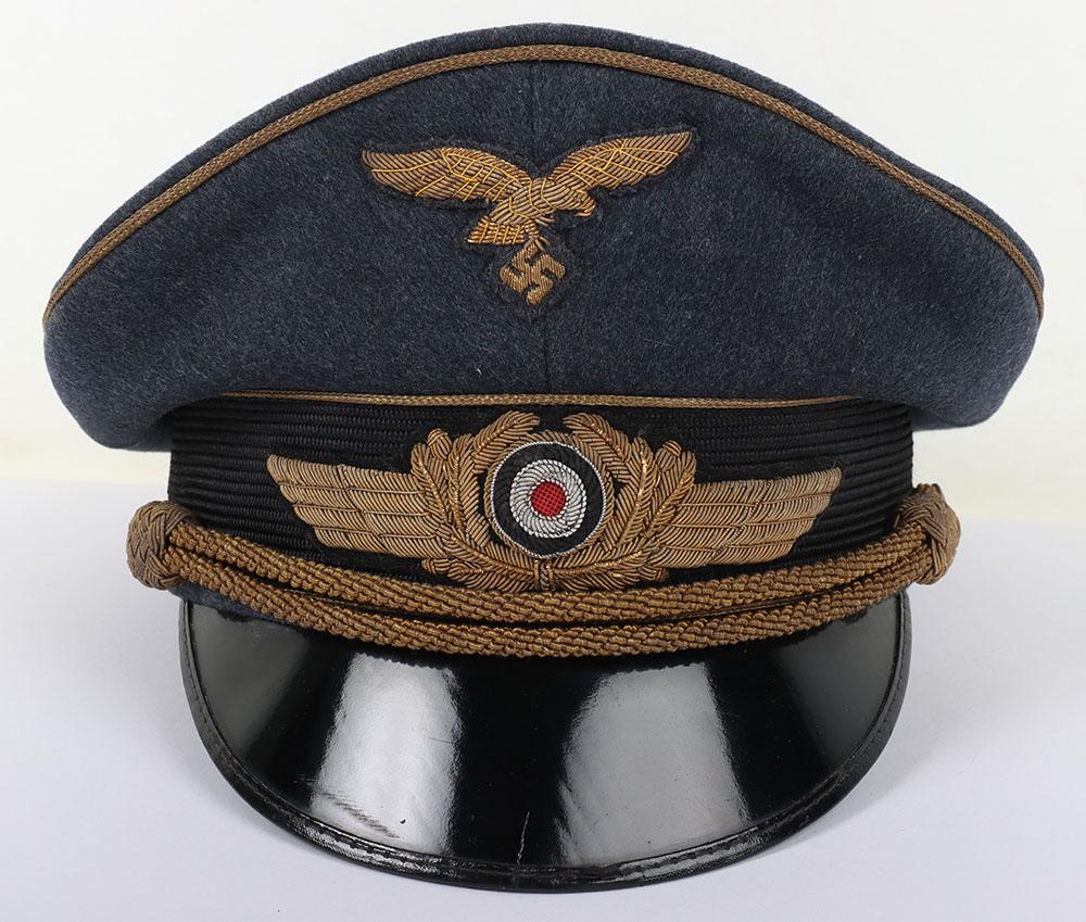 Rare WW2 German Luftwaffe Generals Peaked Cap by Erel: Rare WW2 German Luftwaffe Generals Peaked Cap by Erel, superb example of a wartime produced Luftwaffe generals peaked cap produced in a fine quality dark Luftwaffe blue / grey wool with gold wire pipi