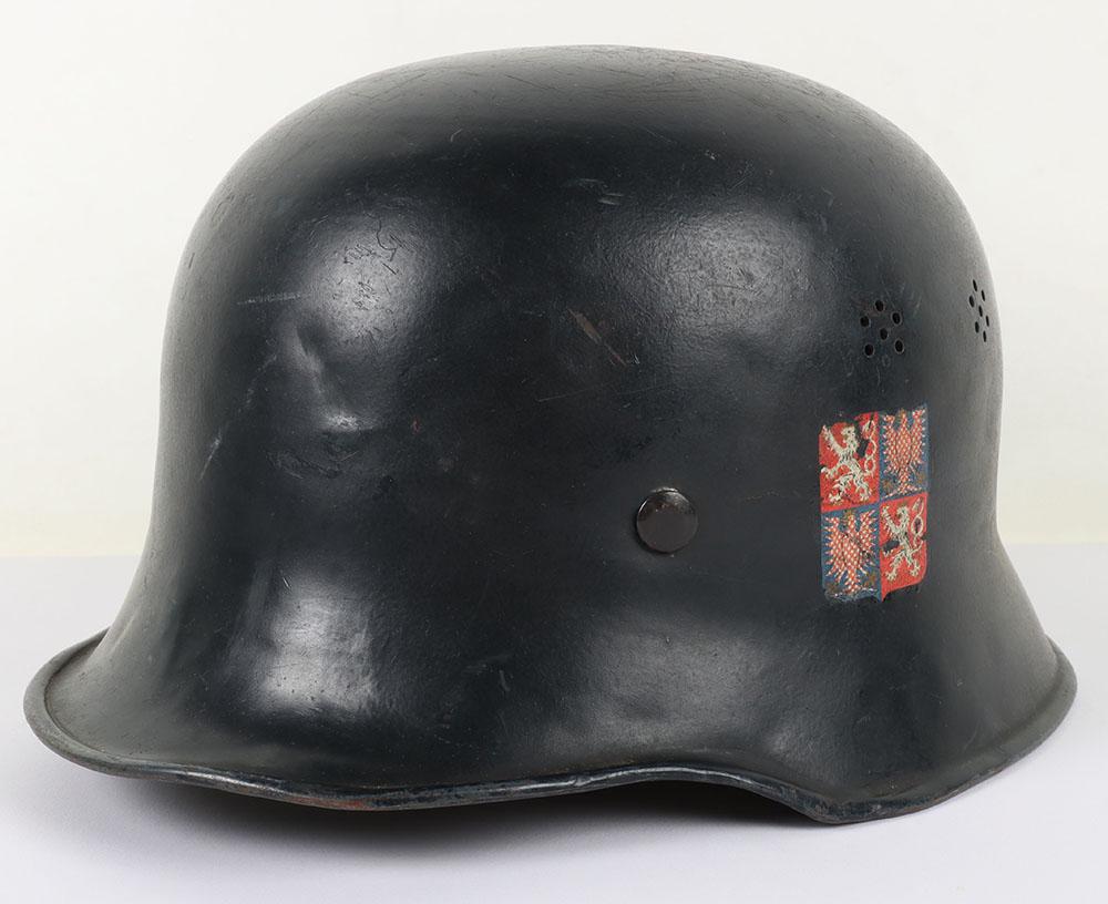 WW2 German Civilian Helmet for Protectorate of Bohemia & Moravia: WW2 German Civilian Helmet for Protectorate of Bohemia & Moravia, black civilian pattern helmet with decals to both sides for the Protectorate of Bohemia & Moravia. Complete with civilian pattern clot