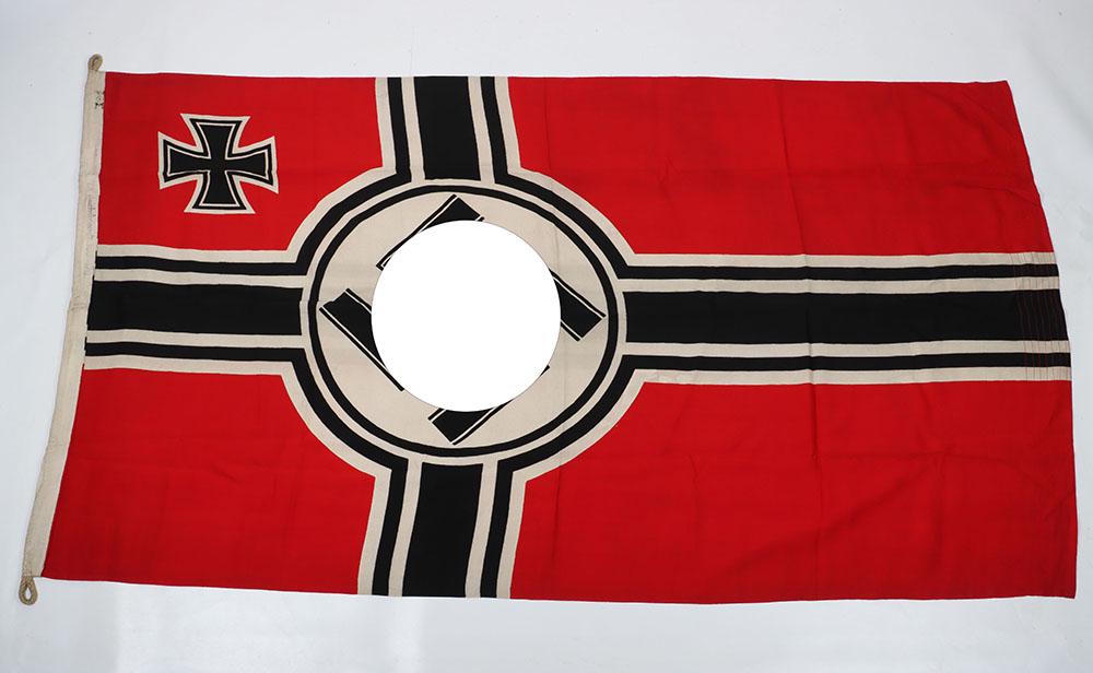 WW2 German Battle Flag (Reichskriegsflagge): WW2 German Battle Flag (Reichskriegsflagge), very good example with Iron Cross to the corner and swastika to the centre. Edge with ink stamps of the marine eagle over M acceptance stamp. Remains of ot
