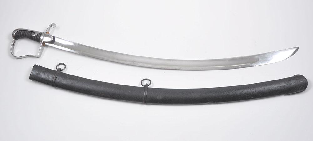 1796 Style Cavalry Sword: 1796 Style Cavalry Sword, with leather covered grip having wire binding. Polished steel guard, langet and back strap. Housed in blackened steel scabbard with two hanging rings. Polished plain curved b