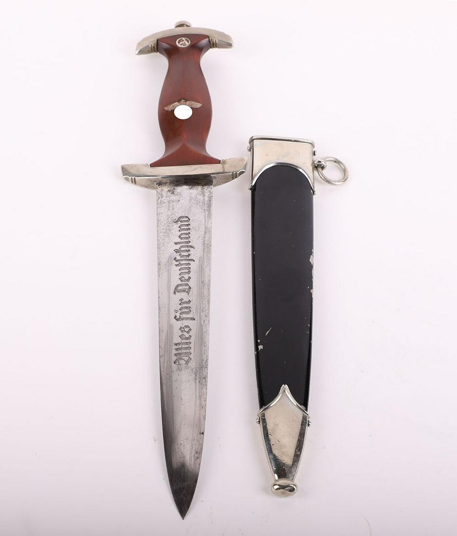 Third Reich NSKK (Nationalsozialistisches Kraftfahrkorps) Dress Dagger by Solinger: Third Reich NSKK (Nationalsozialistisches Kraftfahrkorps) Dress Dagger by Solinger Axt-und-Hauerfabrik, good example of an NSKK dress dagger with deep wooden grip having enamel SA and nickel silver ea