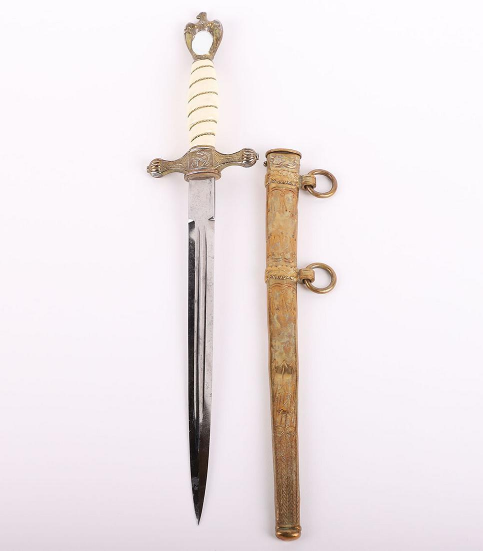 WW2 German Kriegsmarine Officers Dress Dagger by Carl Eickhorn, Solingen: WW2 German Kriegsmarine Officers Dress Dagger by Carl Eickhorn, Solingen, being a late war type with gilded zinc pommel and cross guard with press stud release button. White celluloid grip with wire b