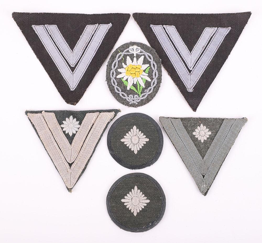 WW2 German Army (Heer) Cloth Rank Insignia: WW2 German Army (Heer) Cloth Rank Insignia, being various types of cloth tunic arm rank chevrons, two large Panzer / fatigue rank chevrons, two circular fatigue / denim combat tunic rank sleeve badges