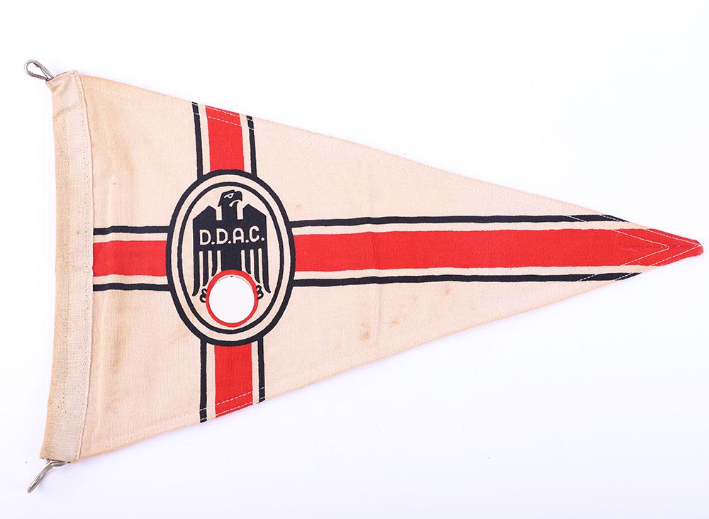 Third Reich D.D.A.C Car Pennant: Third Reich D.D.A.C Car Pennant, triangular cloth double sided car pennant with emblem of the organisation to the edge on both sides. Complete with metal fixing fittings to the edge. Generally good co
