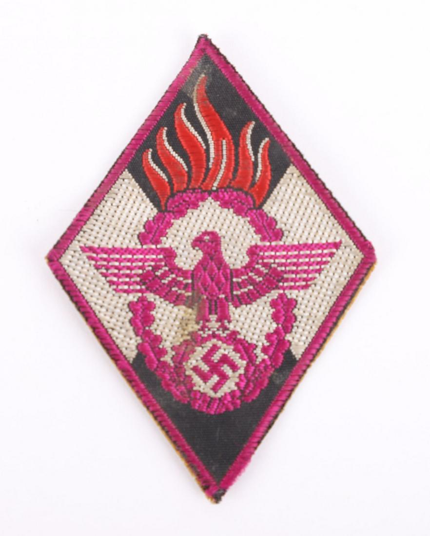 WW2 German Hitler Youth Fire Service Arm Diamond: WW2 German Hitler Youth Fire Service Arm Diamond, good example of a uniform removed example which has a card backing applied to the reverse.