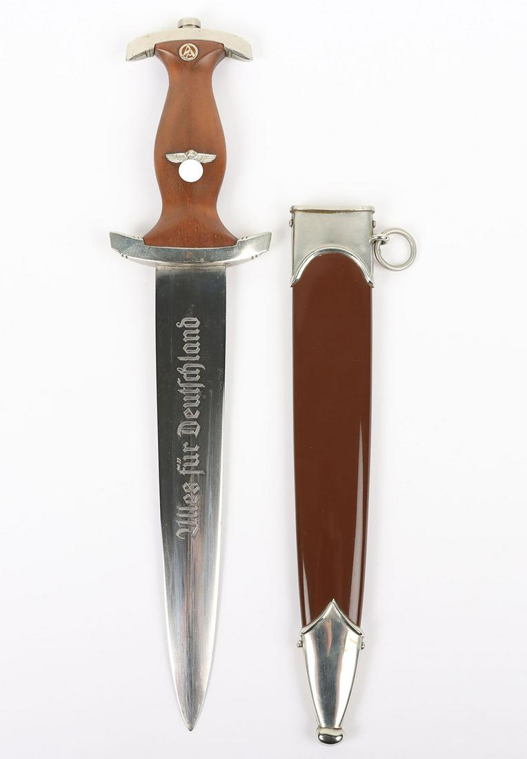 Third Reich Sturmabteilung (S.A) Dress Dagger by Malsch & Ambronn Steinbach: Third Reich Sturmabteilung (S.A) Dress Dagger by Malsch & Ambronn Steinbach, example with brown wooden grip having nickel silver eagle inserted and enamel SA device emblem. Polished nickel silver moun