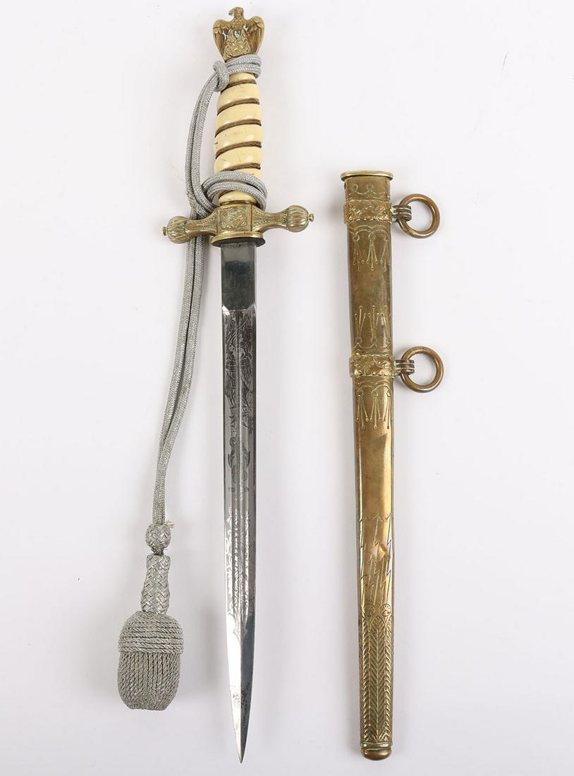 WW2 German Kriegsmarine Officers Dress Dagger by F W Holler Solingen: WW2 German Kriegsmarine Officers Dress Dagger by F W Holler Solingen, generally good example of a naval officers dagger with white celluloid grip having wire binding. Gilt brass eagle pommel top and c