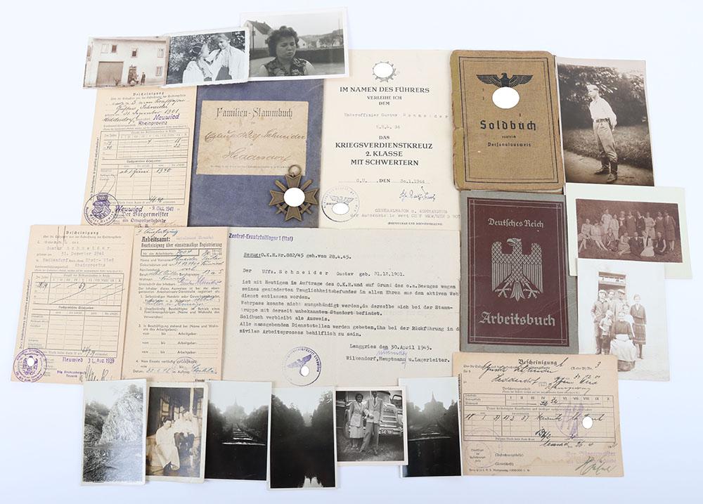 WW2 German Army Soldbuch and War Service Cross 2nd Class Award Grouping: WW2 German Army Soldbuch and War Service Cross 2nd Class Award Grouping, issued to Unteroffizier Gustav Schneider who served in a motor repair and parts depot for the Wehrmacht. Uniform photograph to