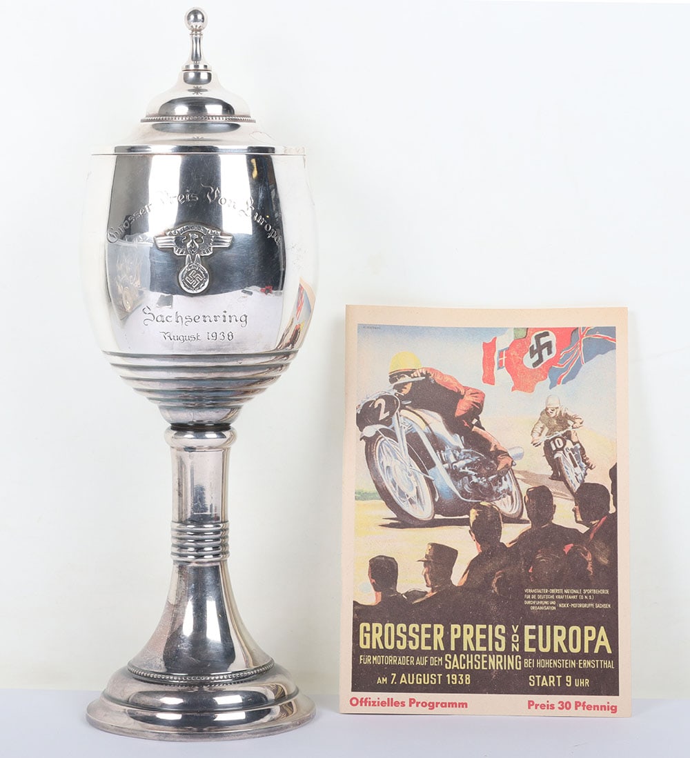 Third Reich NSKK Motorcycle Competition Trophy ‘Grosser Preis Von Europa – Sachsenring August 1938’: Third Reich NSKK Motorcycle Competition Trophy ‘Grosser Preis Von Europa – Sachsenring August 1938’ with Event Programme, fine quality silver plated large trophy cup with NSKK emblem mounted to 