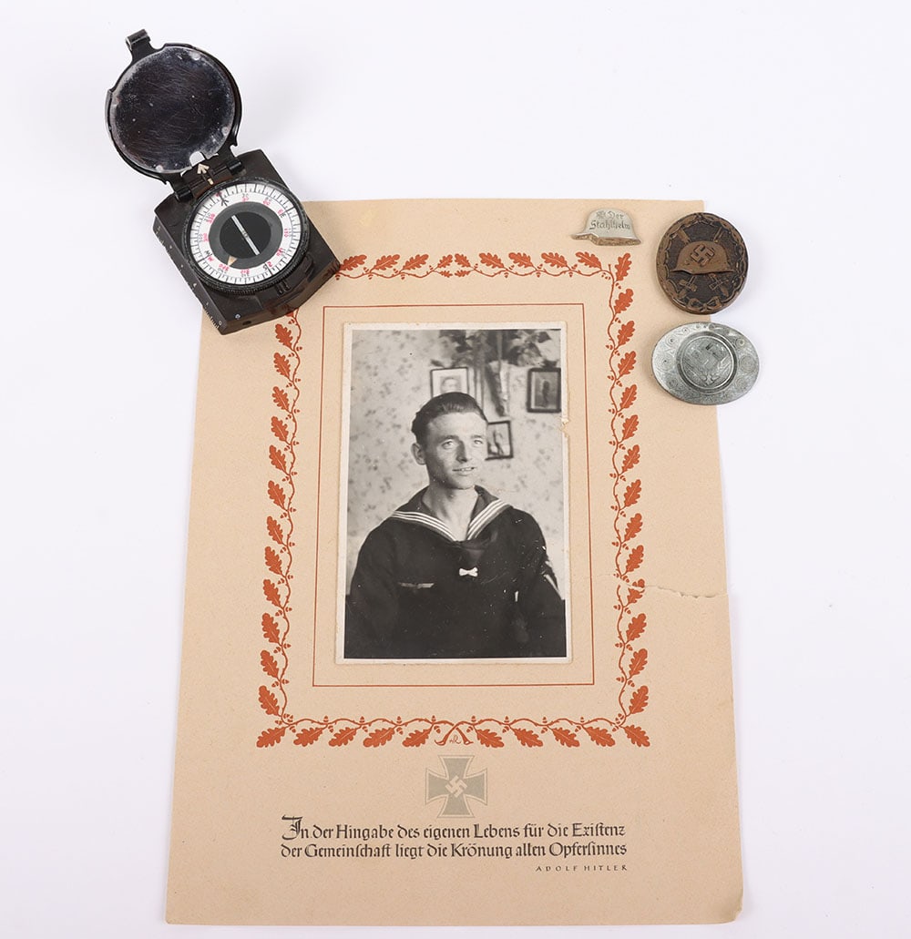 WW2 German Black Grade Wound Badge: WW2 German Black Grade Wound Badge, being a un-maker marked example, complete with the pin and catch fixing to the reverse. Accompanied by a female RAD section brooch, marching compass and photograph 