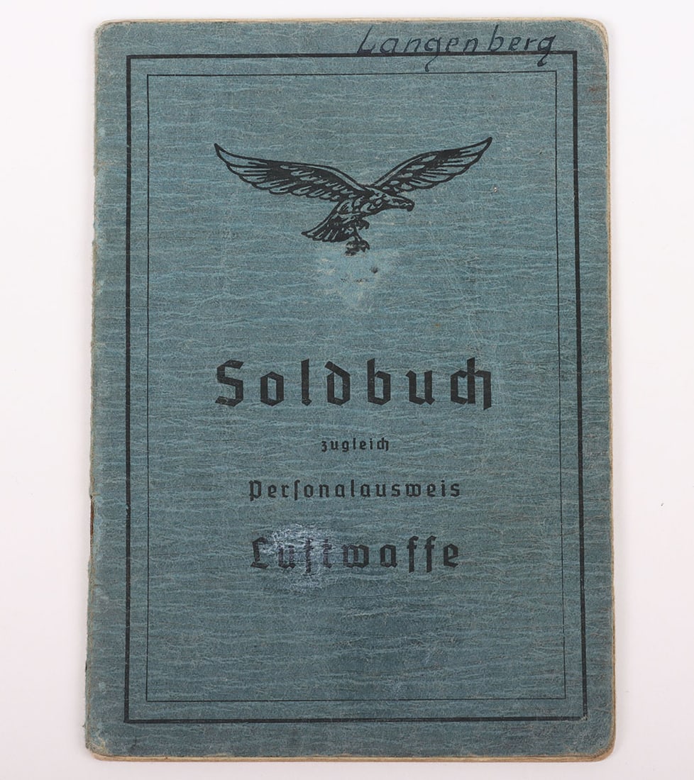 WW2 German Luftwaffe Soldbuch Flak Artillery: WW2 German Luftwaffe Soldbuch Flak Artillery, good example issued in 1944 to Viktor Langenberg. Uniform photograph to the inside. Would appear he served in Flak Ersatz Abt 1. Does not appear to have a