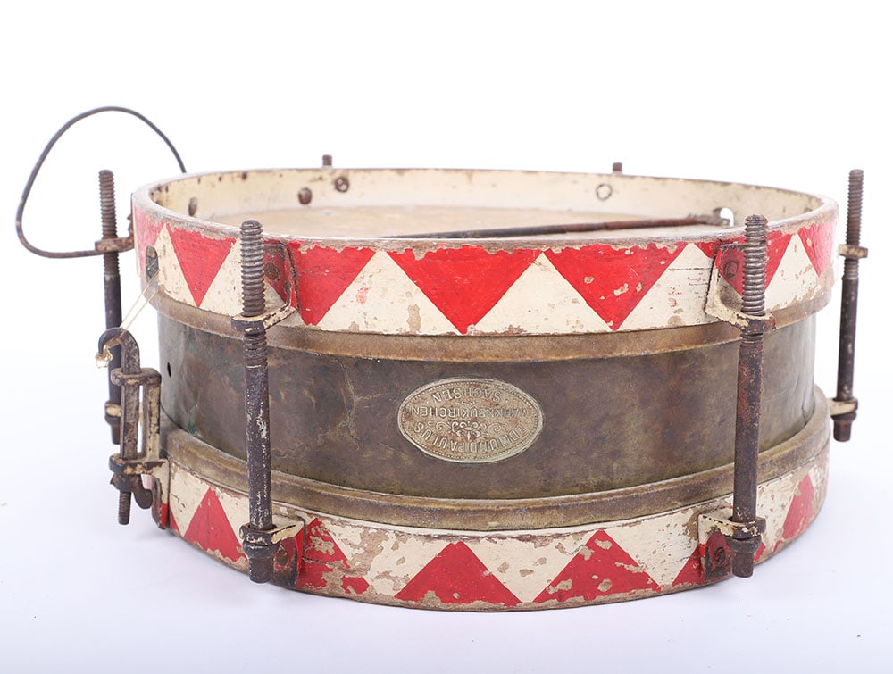 HJ SNARE DRUM: HJ SNARE DRUM, brass body w/ wooden frame & metal hardware, 11 ?? diameter x 5? tall, has all 7 tension screws & waist attachment device, its red & white paint appears original but well worn, its skin