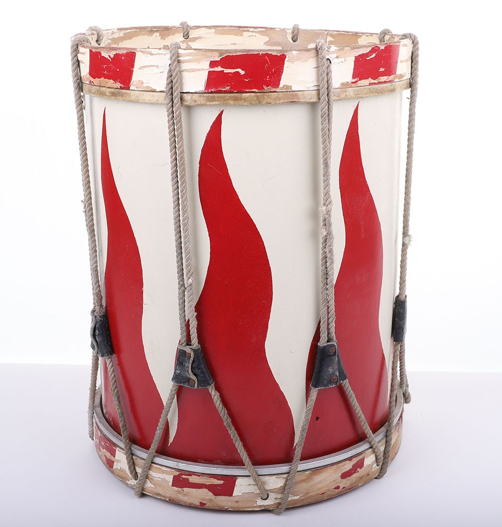 HJ MARCHING DRUM: HJ MARCHING DRUM, wooden body w/ rope tension, 15? diameter x 19? tall, the striking white w/ red flames paint design may be post-war, 1 skin is replaced as are probably the ropes, has a nice appearan