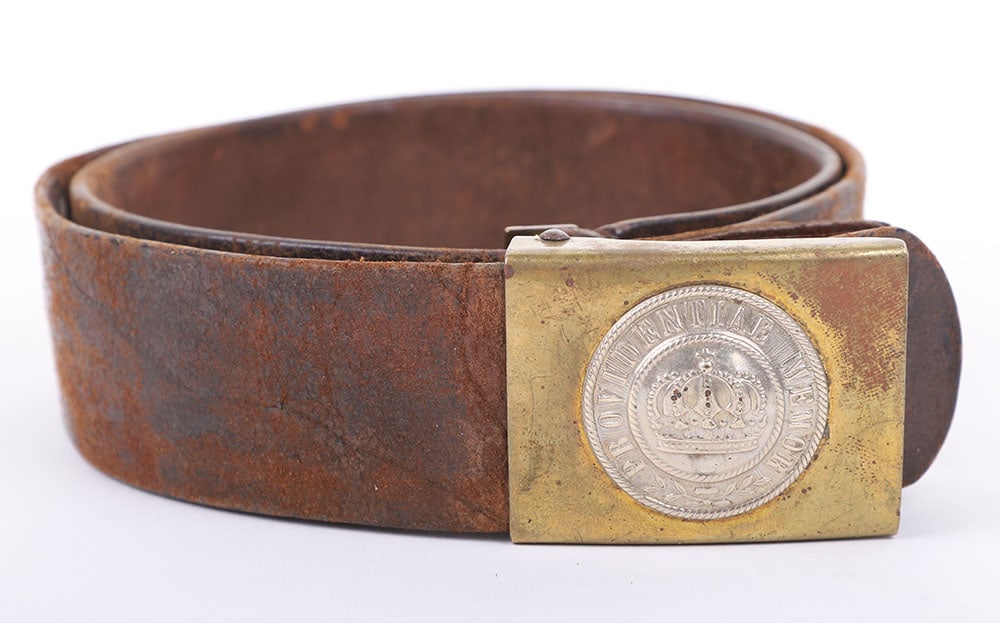 GERMAN WWI SAXON NCO BELT & BUCKLE: GERMAN WWI SAXON NCO BELT & BUCKLE, brass w/ nickel inset (crown w/ ?PROVIDENTIAE MEMOR? on reverse is maker ?G.H. OSANG DRESDEN?, has unmarked brown leather tab, its dark brown leather belt is size ?