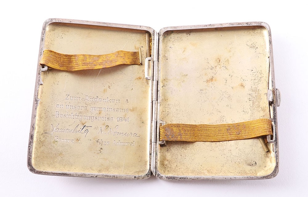 HISTORICALLY INTERESTING PRESENTATION CIGARETTE CASE FROM JAPANESE GENERAL TOMOYUKI YAMASHITA AND: HISTORICALLY INTERESTING PRESENTATION CIGARETTE CASE FROM JAPANESE GENERAL TOMOYUKI YAMASHITA AND VICE ADMIRAL NAOKUNI NOMURA IN 1941, the engine turned German made cigarette case has an engraved insc