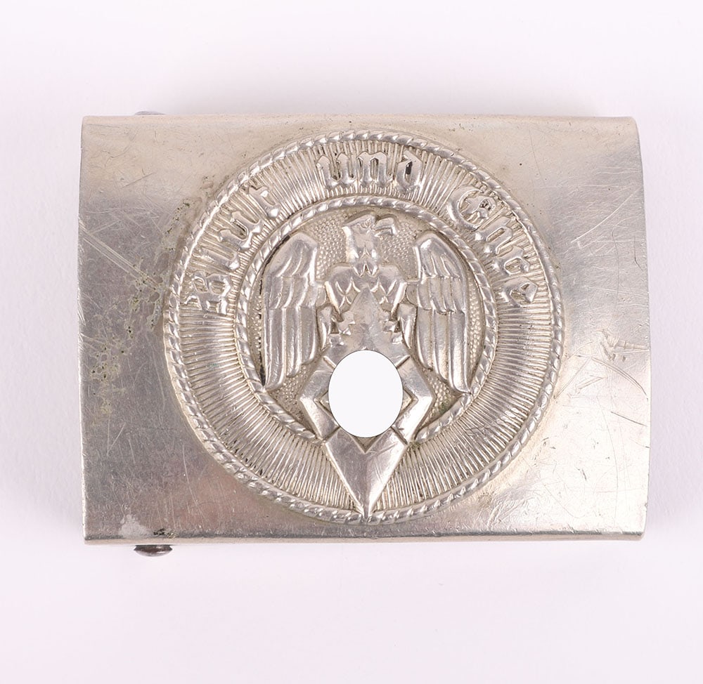THIRD REICH HITLER YOUTH BELT BUCKLE: THIRD REICH HITLER YOUTH BELT BUCKLE, good example of a nickel silver boys buckle with fittings to the reverse. Buckle with stylised ?A? maker mark for Assmann & Sohn, GES GESCH and RZM logo with 17 u
