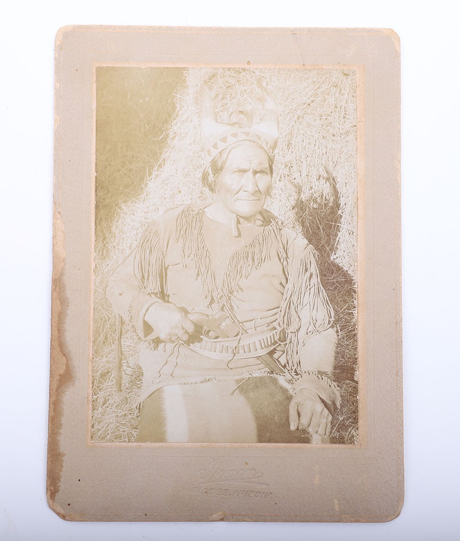 Original photograph of Geronimo by Fly holding a confederate Dance revolver: Original photograph of Geronimo by Fly holding a confederate Dance revolver (most probably a photographer’s prop). Staining, chipping and wear to card stock. Photo generally very good condition imag