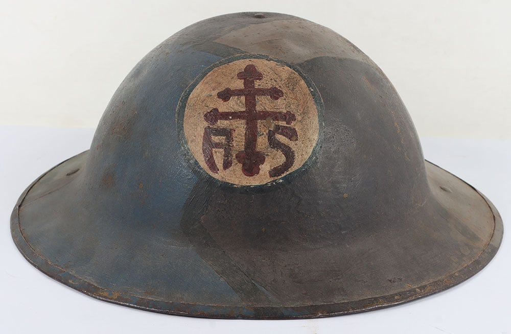 WW1 American Advance Section Services of Supply Camouflaged Steel Helmet Shell: WW1 American Advance Section Services of Supply Camouflaged Steel Helmet Shell, good example of a British made helmet shell which has a blue and grey camouflage paint scheme to the exterior of the she