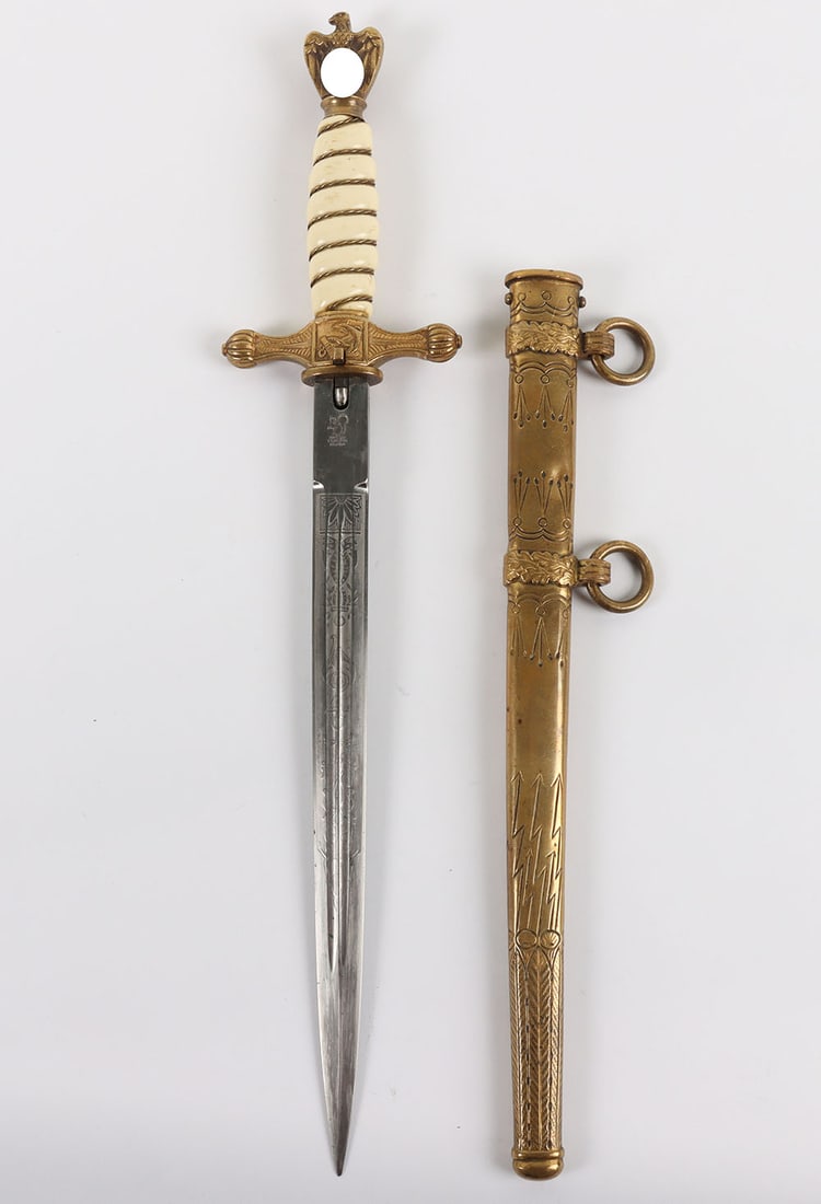 WW2 German Kriegsmarine Officers Dress Dagger by Carl Eickhorn, Solingen: WW2 German Kriegsmarine Officers Dress Dagger by Carl Eickhorn, Solingen, good example of a 2nd pattern naval officers dress dagger with white celluloid grip having the wire binding, gilt brass eagle