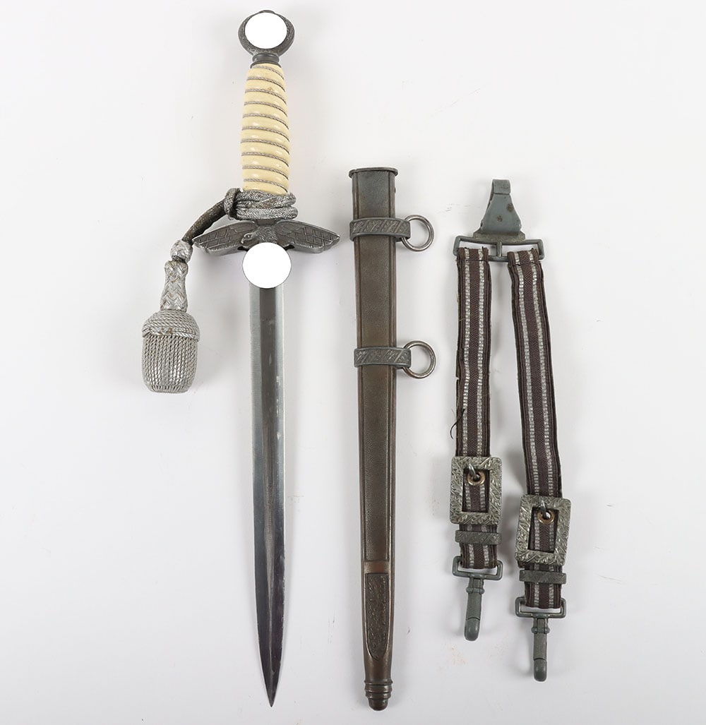 WW2 German Luftwaffe 2nd Pattern Officers Dress Dagger with Straps and Knot by Robert Klaas,: WW2 German Luftwaffe 2nd Pattern Officers Dress Dagger with Straps and Knot by Robert Klaas, Solingen, good example with white celluloid grip retaining the original wire binding. Pommel with swastika