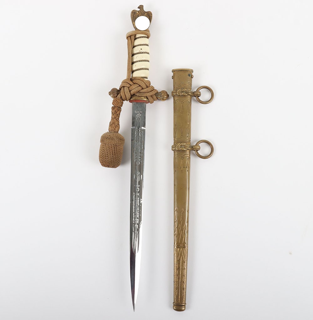 WW2 German Kriegsmarine Officers Dress Dagger by WKC: WW2 German Kriegsmarine Officers Dress Dagger by WKC, fine example with white celluloid grip having the original wire binding. Reverse of the grip is finely engraved with the name of the original owne