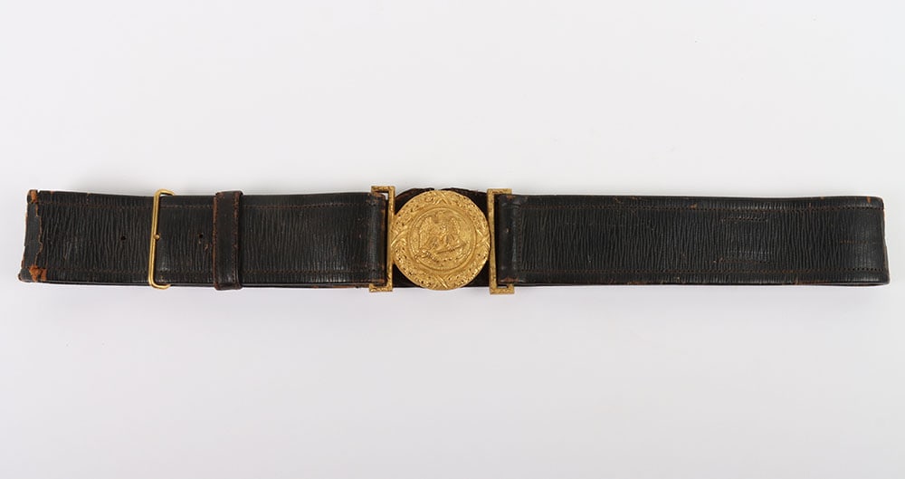 USN CIVIL WAR 1852 PATTERN BUCKLE BELT: USN CIVIL WAR 1852 PATTERN BUCKLE BELT, the gilted brass circular buckle (2? diameter) has eagle & anchor design, its 1 ?? wide black leather belt has brass buckle end & adjustment, has weak area (alm
