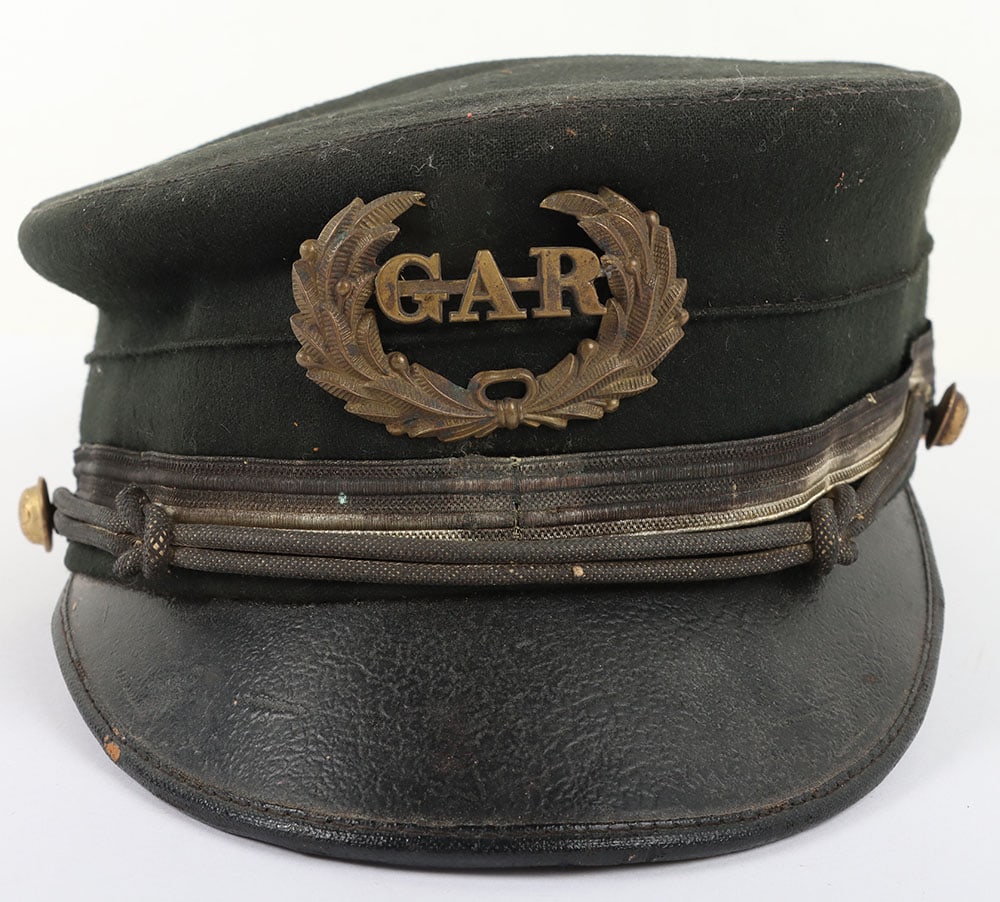 AMERCAN G.A.R. HAT: AMERCAN G.A.R. HAT, a blue doeskin 2 ?? tall w/ a black patent leather visor, has a gold bullion hat cord & trim w/ GAR side-buttons, black satin lining has maker ?Ames Sword Company, Chicopee Mass.?,