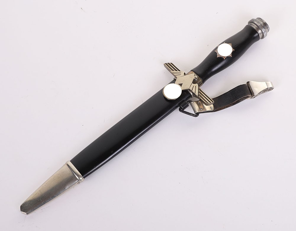 THIRD REICH 2ND PATTERN RLB ENLISTED RANKS DRESS DAGGER,: THIRD REICH 2ND PATTERN RLB ENLISTED RANKS DRESS DAGGER, example with wooden grip having enamel swastika in starburst emblem. Some cracking to the pommel and cross guard appears to be buffed although