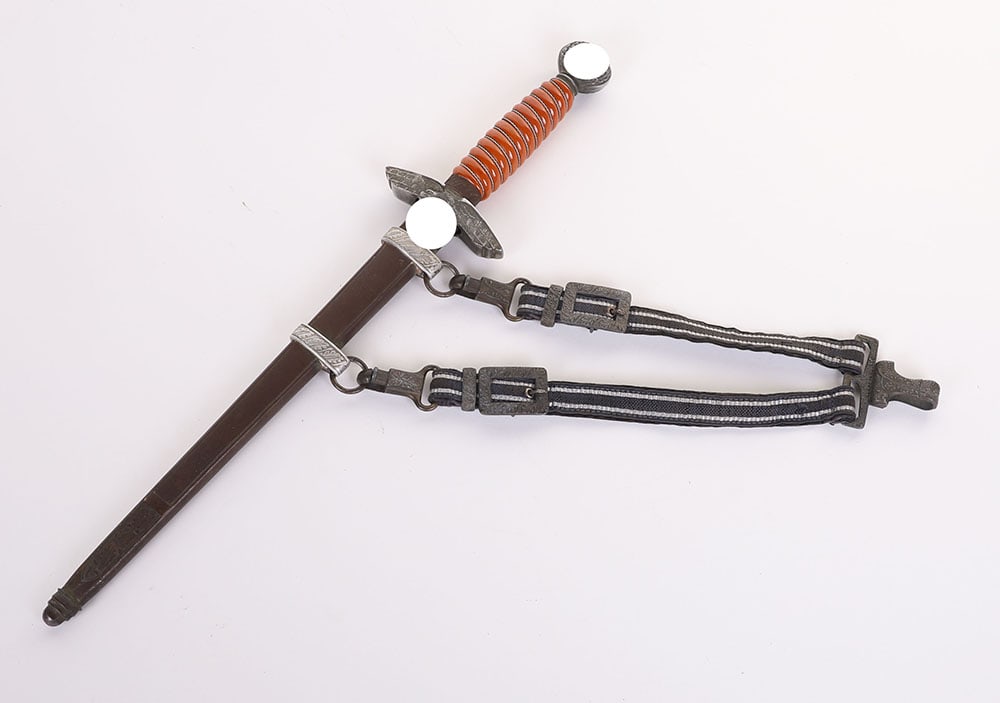 WW2 GERMAN LUFTWAFFE 2ND PATTERN OFFICERS DRESS DAGGER WITH HANGERS BY ROBERT KLASS, SOLINGEN: WW2 GERMAN LUFTWAFFE 2ND PATTERN OFFICERS DRESS DAGGER WITH HANGERS BY ROBERT KLASS, SOLINGEN, good untouched example with deep orange celluloid grip having the original wire binding. Housed in its st