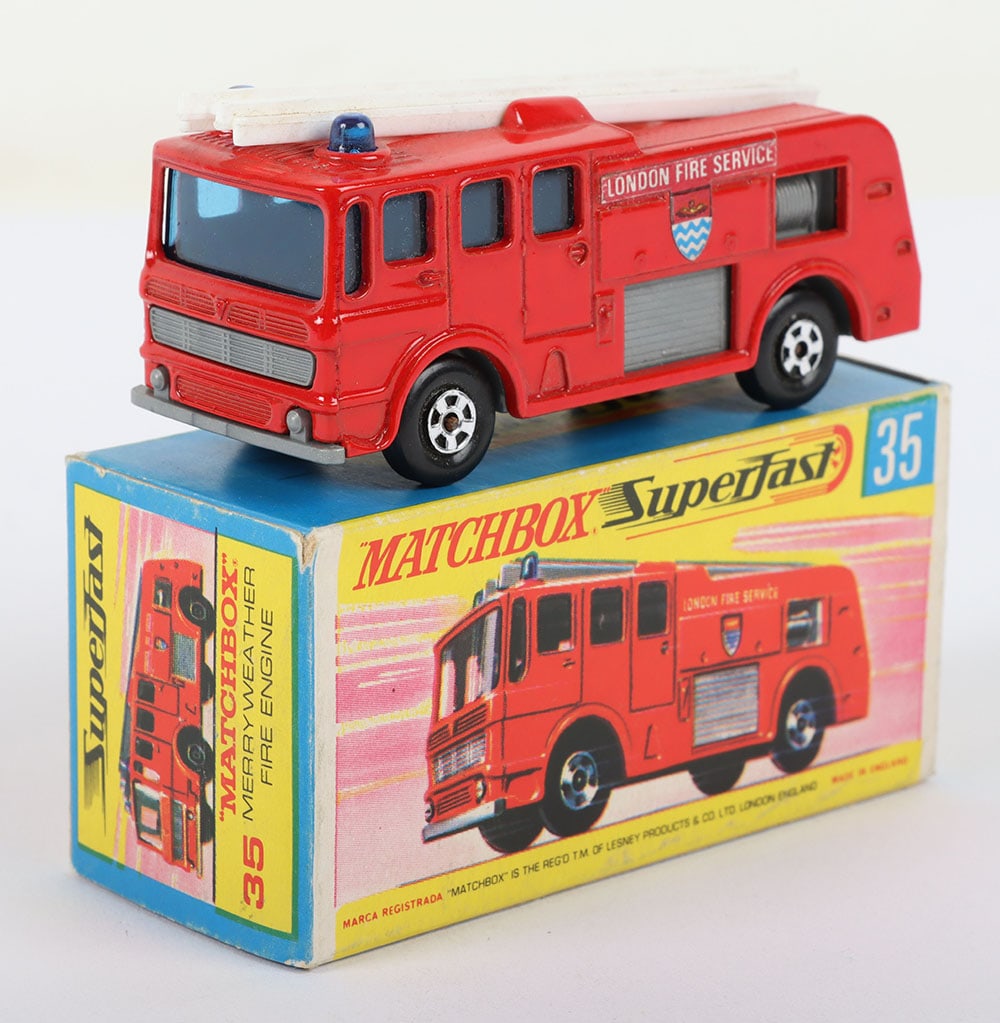 Matchbox Lesney Superfast MB-35 Merryweather Fire Engine with THIN wheels: Matchbox Lesney Superfast Boxed Model, England: MB-35 Merryweather Fire Engine with THIN wheels and G box WITHOUT NEW to end flaps, Red body with side labels, Grey base with Black PLASTIC CLIPS, THIN