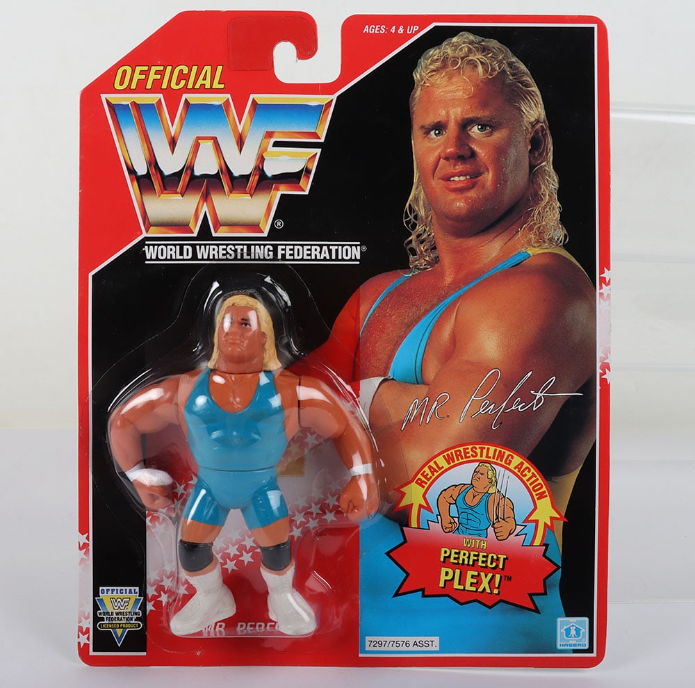 Mr Perfect series 8 WWF Wrestling figure by Hasbro: Mr Perfect series 8 WWF Wrestling figure by Hasbro. Fully sealed, very small dent to bubble near figures left hand. Very slight veining to bottom right hand corner of card. Comes with custom acrylic c