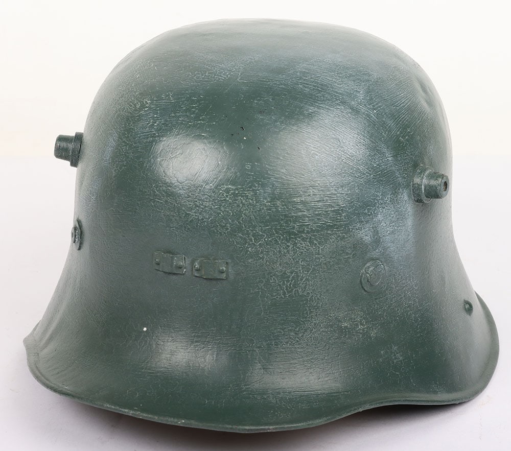Irish Vickers Helmet: Irish Vickers Helmet, complete with the original liner, the leather band stamped with Dublin makers mark T Smith & Son 1927. Leather chinstrap attached. Helmet rim stamped with Vickers mark. Green pai