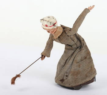 Fernand Martin tinplate c/w maid with broom chasing a mouse: Fernand Martin tinplate c/w maid with broom chasing a mouse, with hand painted head, cotton striped clothes, when wound maid moves forward whilst bending at the waist and hitting the floor with her br