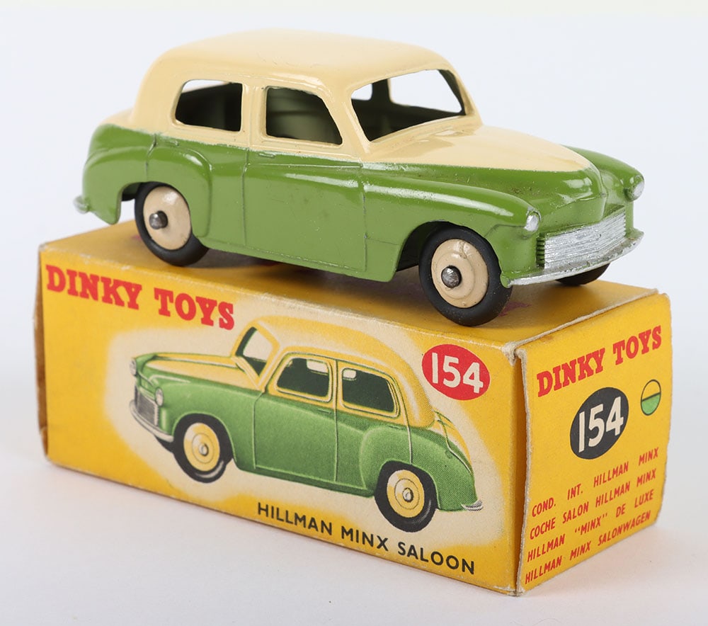Dinky Toys 154 Hillman Minx Saloon Two-Tone: Dinky Toys 154 Hillman Minx Saloon Two-Tone, lime green lower body, cream body/wheel hubs, in near mint original condition, some minor wear, original picture box, with correct colour spots, in very go