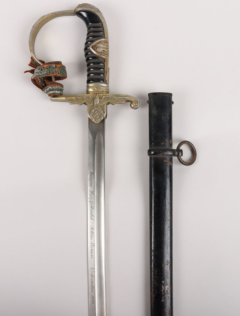 WW2 German Army Christmas 1942 Presentation Prinz Eugen Pattern Officers Sword by Carl Eickhorn,: WW2 German Army Christmas 1942 Presentation Prinz Eugen Pattern Officers Sword by Carl Eickhorn, Solingen, black celluloid grip with wire binding still intact. Gilded alloy hilt with eagle cross guard