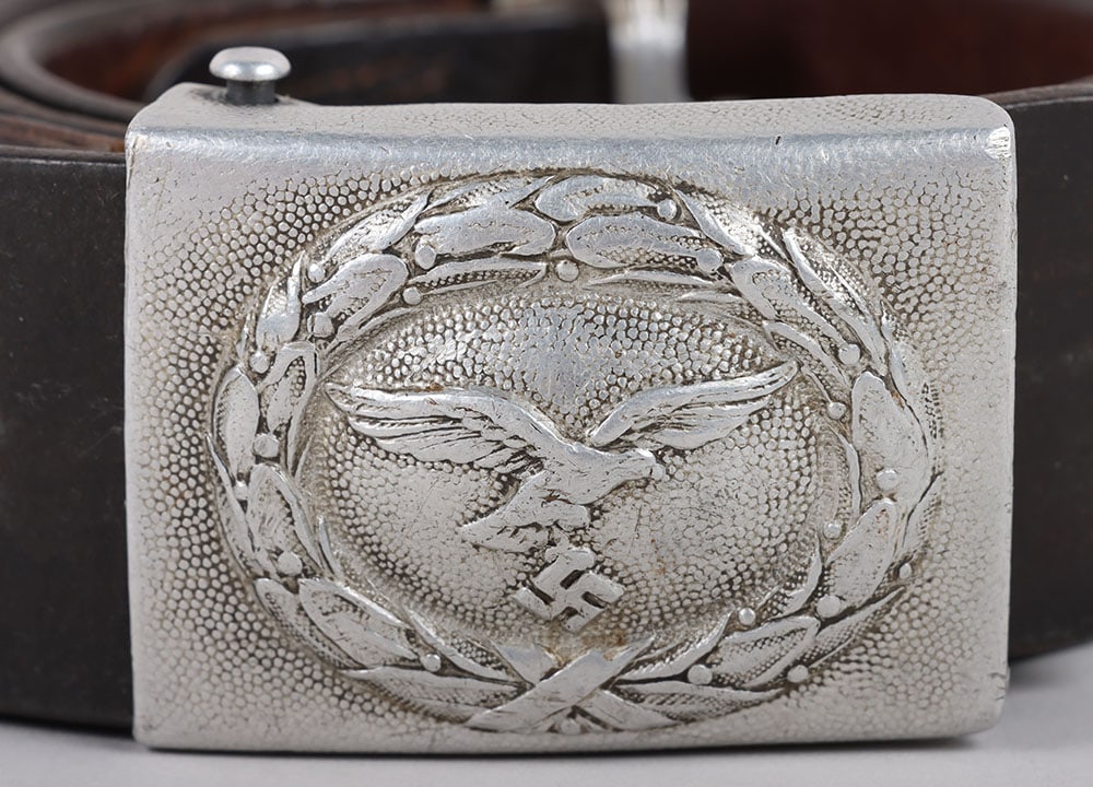 WW2 German Luftwaffe Other Ranks Belt and Buckle by Richard Sieper & Sohne “R.S.&S.: WW2 German Luftwaffe Other Ranks Belt and Buckle by Richard Sieper & Sohne “R.S.&S.”, aluminium buckle, maker marked on the reverse with the initials of Simm. Leather tongue with typical Luftw