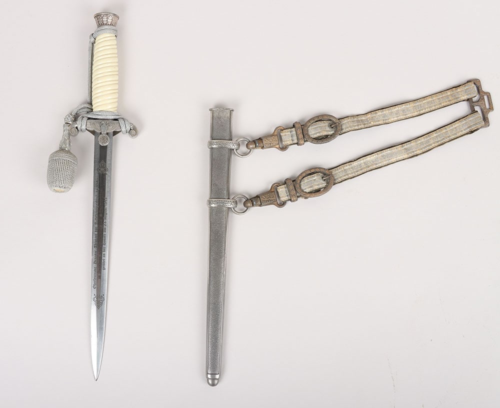 WW2 German Army Officers Dress Dagger by A Schuttelhofer & Co, Solingen-Wald, with Post War: WW2 German Army Officers Dress Dagger by A Schuttelhofer & Co, Solingen-Wald, with Post War Dedication to an Officer Killed on Eastern Front, with white celluloid grip, pommel with oakleaves relief, e